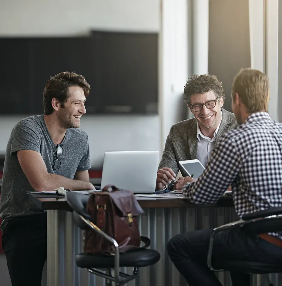 Innovix GlobalTech consultants reviewing a project with a client